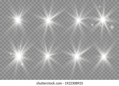 White glowing light explodes on a transparent background. Sparkling magical dust particles. Bright Star. Transparent shining sun, bright flash. Vector sparkles. To center a bright flash.