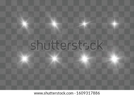 White glowing light explodes on a transparent background. Sparkling magical dust particles. Bright Star. Transparent shining sun, bright flash. Vector sparkles. To center a bright flash.