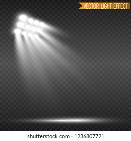 White glowing light.Stadium floodlights brightly illuminate evening or night sports games, concerts, shows, events. Isolated on a transparent background. Arenas of bright spotlights. Bright lights.