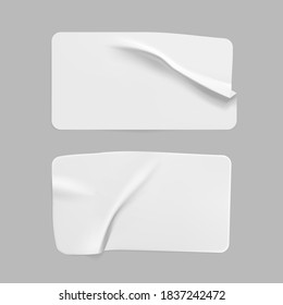 White glued crumpled rectangle stickers mock up set. Blank white adhesive paper or plastic sticker label with wrinkled and creased effect. Template label tags close up. 3d realistic vector