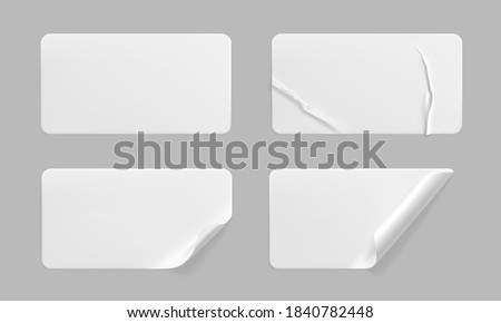 White glued crumpled stickers with curled corners mock up set. Blank white adhesive paper or plastic sticker label with wrinkled and creased effect. Template label tags close up. 3d realistic vector