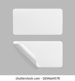 White glued rectangle stickers with curled corners mock up set. Blank white adhesive paper or plastic sticker label with wrinkled and creased effect. Template label tags close up. 3d realistic vector