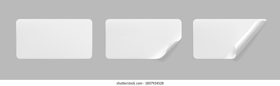 White glued rectangle stickers with curled corners mock up set. Blank white adhesive paper or plastic sticker label with wrinkled and creased effect. Template label tags close up. 3d realistic vector