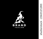 White Goat On The Mountain Logo Design. Goat standing proudly on the top of the mountain Logo Design.