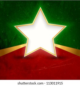 A white gold rimmed star with space for your text on dark red green grunge background. Great background design for Christmas themed projects.