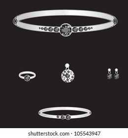 white gold set from necklace ring earrings brooch and bracelets with black brilliants on black background