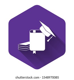 White Graduation cap and book icon isolated with long shadow. Purple hexagon button. Vector Illustration