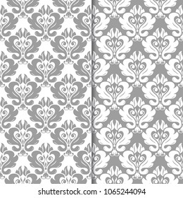 White and gray set of floral backgrounds. Seamless patterns for textile and wallpapers