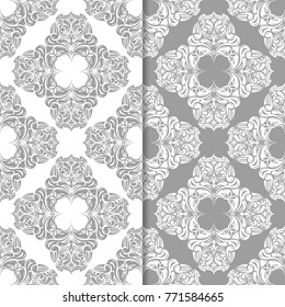 White and gray set of floral backgrounds. Seamless patterns for textile and wallpapers