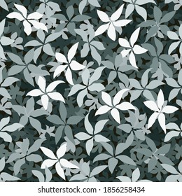 White and green halftone leaves silhouettes on the pastel green background. White frost on mint green decorative style clothing masking camo repeat print. Light green colors winter forest texture