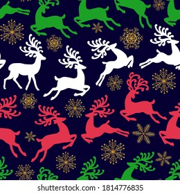 White, green, red deer and gold snowflakes on a blue background. Christmas seamless pattern with running animals.