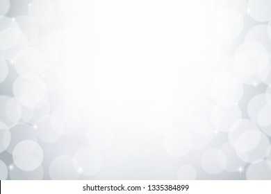 White and grey bokeh effect, Winter blurred background, Abstract snowy concept backdrop.