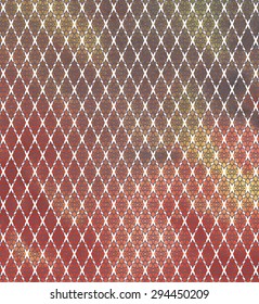 White grill on a colored background.