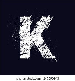 White grunge letter K isolated on dark background. eps10