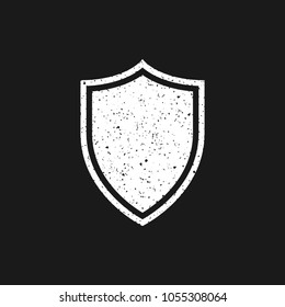 White grunge shield icon on black background. Vector illustration