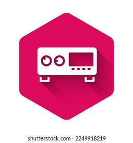 White Guitar amplifier icon isolated with long shadow. Musical instrument. Pink hexagon button. Vector