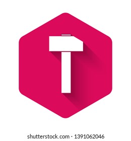 White Hammer icon isolated with long shadow. Tool for repair. Pink hexagon button. Vector Illustration