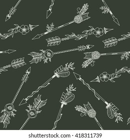 White hand drawn boho arrows on a black background. Vector seamless pattern