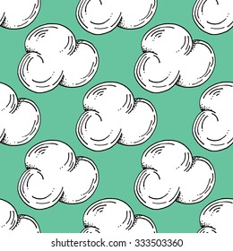 White Hand Drawn Clouds Pattern on Flat Green Background - Crafted  Seamless Doodle Pattern - Vector Illustration
