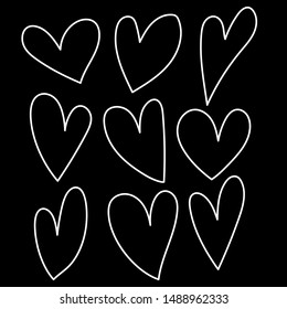 White Hand drawn hearts on isolated black background. Set of love signs. Unique image for design. Black and white illustration. Elements for design - vector design

