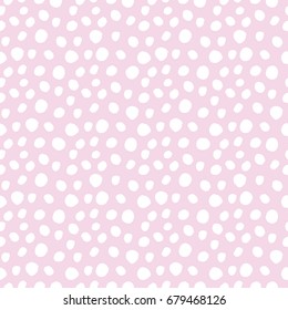 White hand drawn polka dot seamless pattern isolated on pink, rose, magenta background. Abstract acrylic painting spots, stains for print, fabric textile, design kids greeting cards. Repeat ornament.