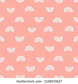 White hand drawn rainbow seamless pattern with pink background.
