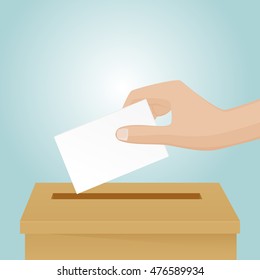 The white hand hold a voting paper