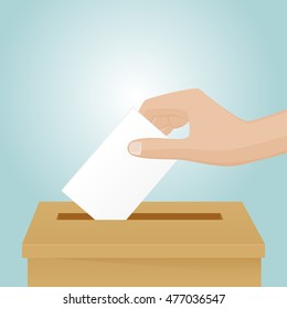 The white hand hold a voting paper