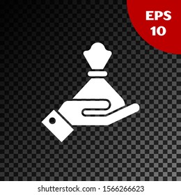 White Hand holding money bag icon isolated on transparent dark background. Dollar or USD symbol. Cash Banking currency sign.  Vector Illustration