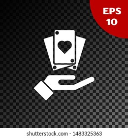 White Hand holding playing cards icon isolated on transparent dark background. Сasino game design.  Vector Illustration
