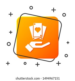 White Hand holding playing cards icon isolated on white background. Сasino game design. Orange square button. Vector Illustration