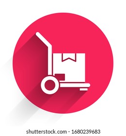 White Hand truck and boxes icon isolated with long shadow. Dolly symbol. Red circle button. Vector Illustration
