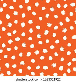 White Hand-Drawn Doodle Irregular Random Polka Dots on Orange Background Vector Seamless Pattern. Colorful Abstract Geometric Background. Bubbles, Circles, Dots, Scribbles, Spots, Marks.