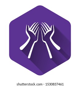 White Hands icon isolated with long shadow. Purple hexagon button. Vector Illustration
