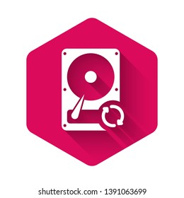 White Hard disk drive HDD sync refresh icon isolated with long shadow. Pink hexagon button. Vector Illustration