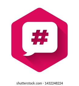 White Hashtag speech bubble icon isolated with long shadow. Concept of number sign, social media marketing, micro blogging. Pink hexagon button. Vector Illustration
