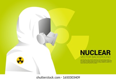 White Hazmat suit with full mask and nuclear background. Concept for radioactive hazard and nuclear protection situation