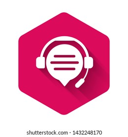 White Headphones with speech bubble chat icon isolated with long shadow. Support customer service, hotline, call center, faq, maintenance. Pink hexagon button. Vector Illustration