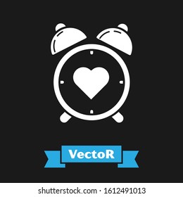 White Heart in the center alarm clock icon isolated on black background. Valentines day.  Vector Illustration