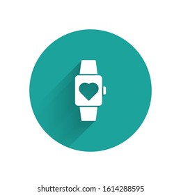 White Heart in the center wrist watch icon isolated with long shadow. Valentines day. Green circle button. Vector Illustration