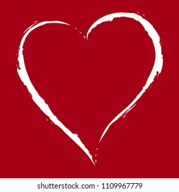 white heart drawing with the brush on red background