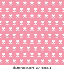 White heart flower on pink background. Happy Valentine's day. Heart pattern on pink backdrop.