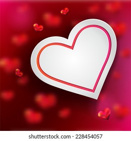 white heart on red background with red blur hearts. Valentine's background. Love.