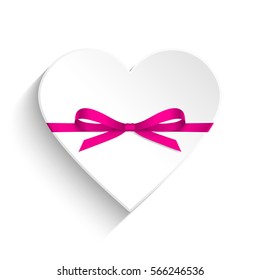 White heart with pink bow
