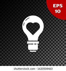 White Heart shape in a light bulb icon isolated on transparent dark background. Love symbol. Valentine day symbol.  Vector Illustration