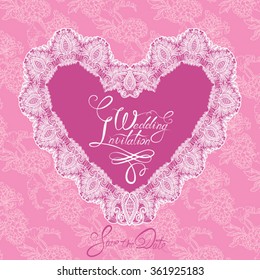 White Heart shape is made of lace doily on pink floral background, Wedding Invitation Card with calligraphic text Save the Date