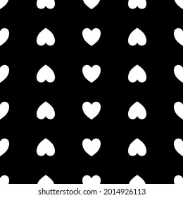 White heart shape and white heart upside down on black background. seamless pattern.