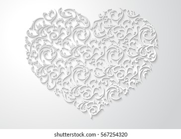 White heart shaped floral pattern with leaves. Patterned 3d love symbol with shadow on light background. Happy Valentines day beautiful paper cut postcard