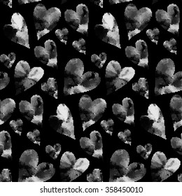 White hearts made from many round dots. Seamless  Valentine's Day pattern. Seamless heart background in white and black colors.