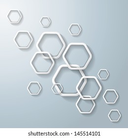 White hexagos with shadows on the grey background. Eps 10 vector file.